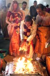 Groom offers to sacrificial fire Hindu wedding ceremony
