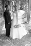 bride and groom under rose arbor black and white Hindu wedding and Western Wedding
