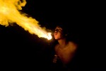 Fire breathing young man in Big Sur 1