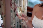 Bride toasts with champagne glass