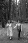 Bride and Groom walk each other to isle wedding Evergreen Lodge in Goveland, CA