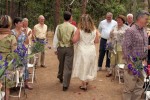 Bride and Groom walk each other down isle wedding Evergreen Lodge in Goveland, CA