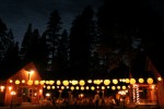 Night shot wedding reception glowing lanterns wedding Evergreen Lodge in Goveland, CA
