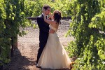 Bride and Groom in Grape Vines wedding Trentadue Winery, a Sonoma County winery in Alexander Valley