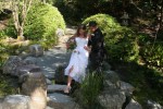 Bride and groom by waterfall. Wedding, UC Berkeley Botanical Gardens