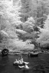 Kids on inner tube. Infrared photography of the Big Sur River on the summer solstice.