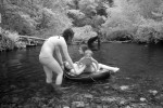 Kids on inner tube. Infrared photography of the Big Sur River on the summer solstice.
