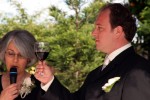 Groom toasts bride with ceremonial wine during wedding ceremony in Los Gatos