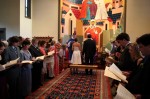 Wedding ceremony at St. Gregory's of Nyssa Episcopal Church in San Francisco. Congregation singing