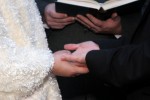 Bride and groom hands. Winter wedding, Yosemite National park, just under bridal veil falls.