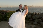Sunset wedding photo taken on Treasure Island with views of San Francisco and the Bay Bridge