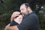 Father and Son hug during a portrait session