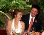 Northern california wedding photogaphy. Candid photojournalistic shot of the bride and groom laughing in the reception.