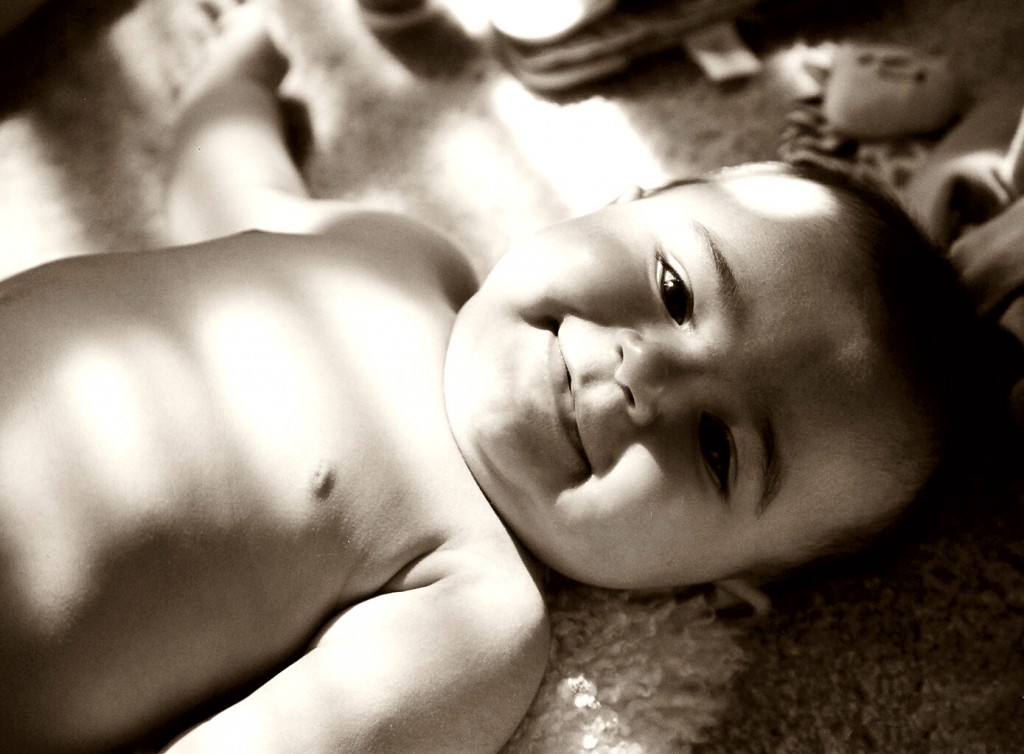Infant child in sepia photo