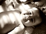 Infant child in sepia photo