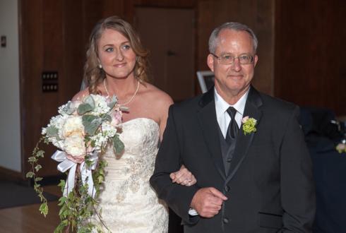 Bride and her father just before they start walking down the isle. 