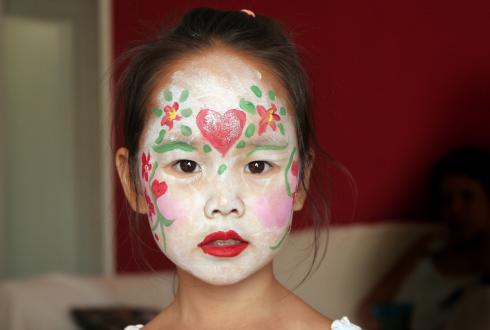Five year old girl in facepaint.